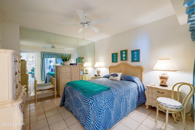 bedroom featuring light tile patterned flooring and ceiling fan