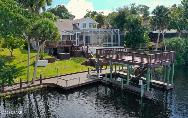 3 Tomoka View Dr, Ormond Beach, FL 32174 - dock featuring a hot tub, stairs, a yard, and a deck with water view