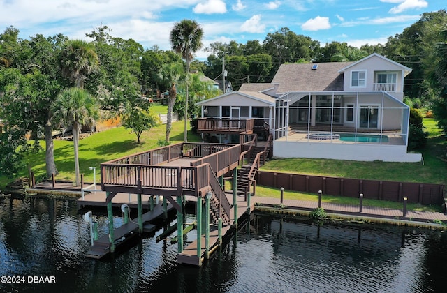 3 Tomoka View Dr, Ormond Beach, FL 32174 - dock with a yard, a deck with water view, a patio, and view of wooded area