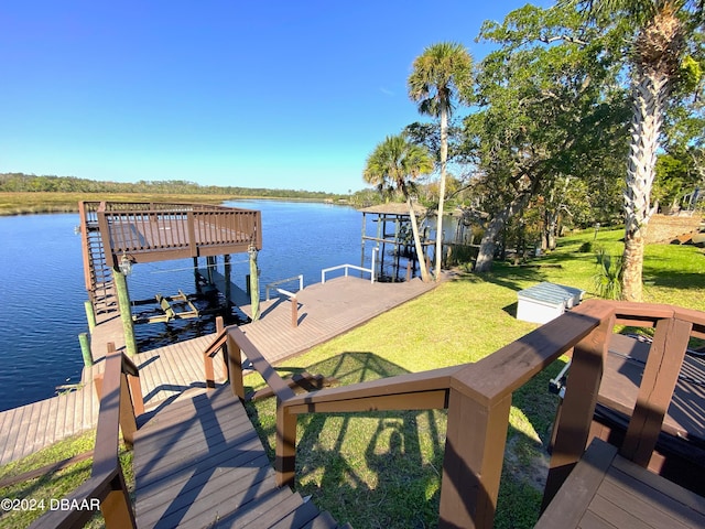 3 Tomoka View Dr, Ormond Beach, FL 32174 - dock area featuring a water view, a yard, and boat lift