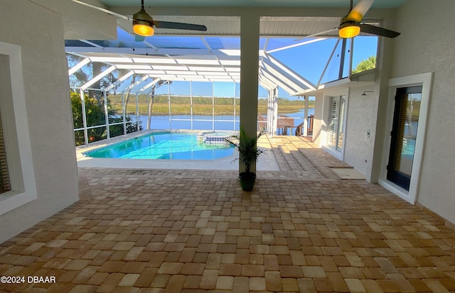 3 Tomoka View Dr, Ormond Beach, FL 32174 - view of pool featuring a water view, ceiling fan, a patio, and a lanai