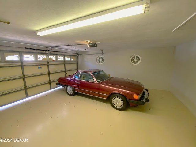 3 Tomoka View Dr, Ormond Beach, FL 32174 - garage featuring a garage door opener