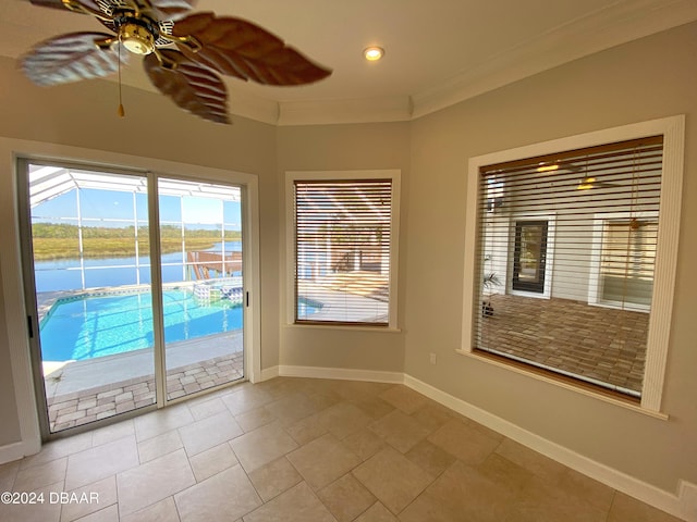 3 Tomoka View Dr, Ormond Beach, FL 32174 - unfurnished room featuring a ceiling fan, a water view, ornamental molding, baseboards, and light tile patterned flooring