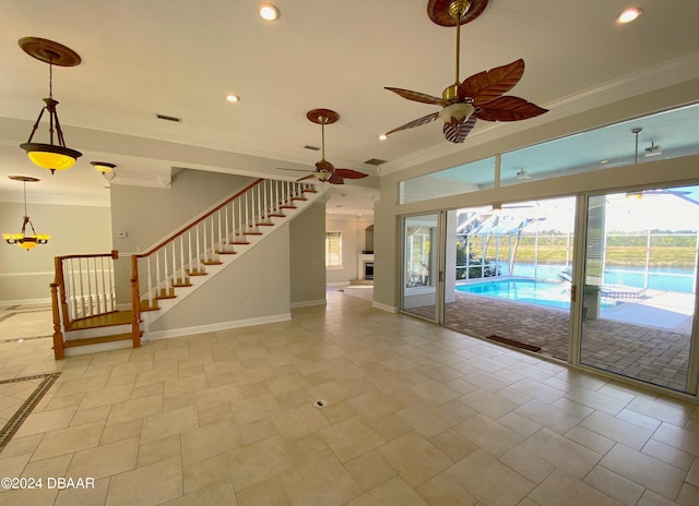 3 Tomoka View Dr, Ormond Beach, FL 32174 - spare room featuring crown molding, a ceiling fan, baseboards, recessed lighting, and stairway
