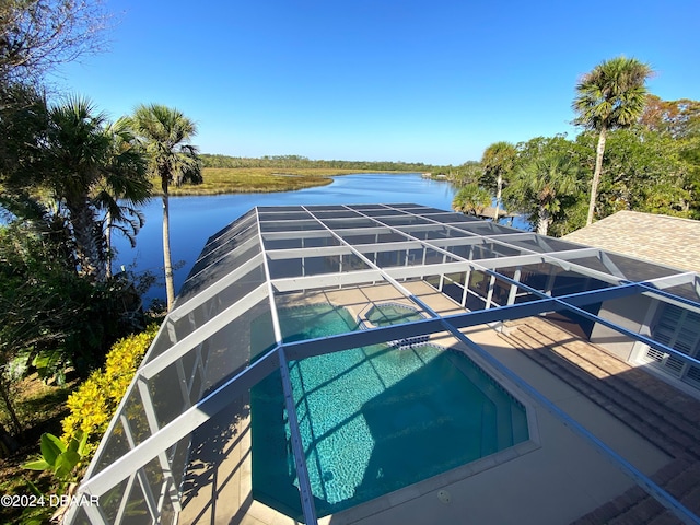 3 Tomoka View Dr, Ormond Beach, FL 32174 - outdoor pool with a water view, an in-ground hot tub, and a lanai