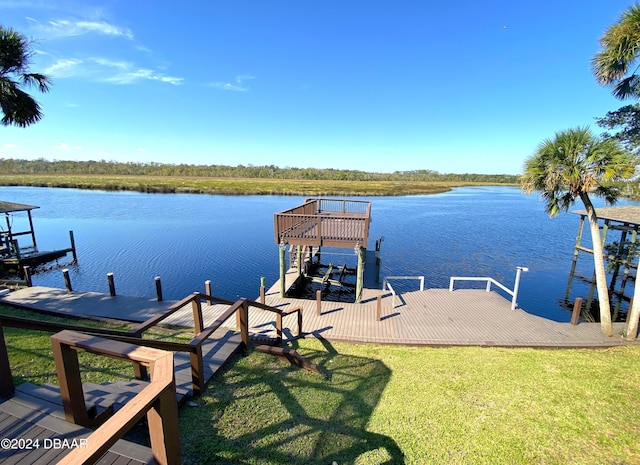 3 Tomoka View Dr, Ormond Beach, FL 32174 - dock area with a water view and a lawn