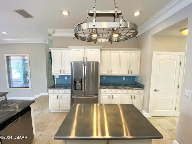 3 Tomoka View Dr, Ormond Beach, FL 32174 - kitchen with stainless steel appliances, ornamental molding, white cabinetry, light tile patterned floors, and recessed lighting