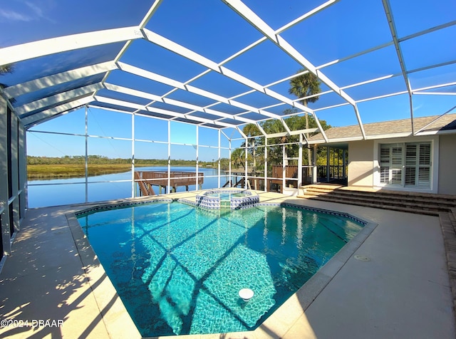 3 Tomoka View Dr, Ormond Beach, FL 32174 - view of swimming pool featuring a water view, a pool with connected hot tub, and a patio