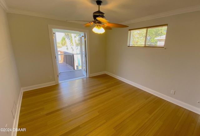 3 Tomoka View Dr, Ormond Beach, FL 32174 - spare room featuring healthy amount of natural light, light wood finished floors, a ceiling fan, crown molding, and baseboards