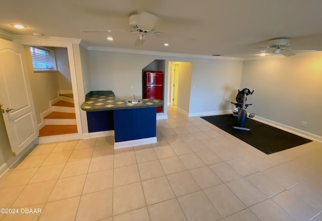 3 Tomoka View Dr, Ormond Beach, FL 32174 - kitchen with ceiling fan, dark countertops, crown molding, recessed lighting, and baseboards