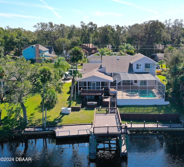 3 Tomoka View Dr, Ormond Beach, FL 32174 - rear view of property featuring a water view, a yard, boat lift, and a patio