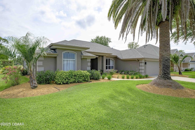single story home featuring concrete driveway, stucco siding, an attached garage, and a front yard