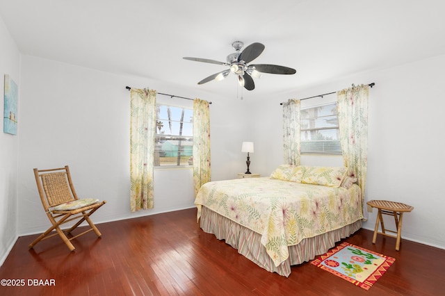 bedroom featuring dark wood-type flooring and ceiling fan