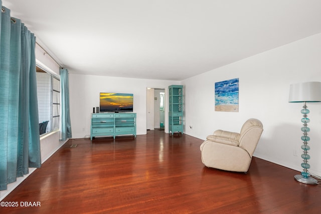 unfurnished room featuring dark hardwood / wood-style floors