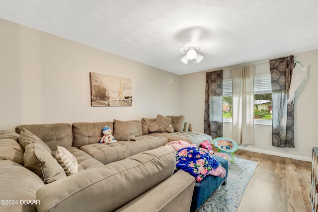 living room with light hardwood / wood-style flooring