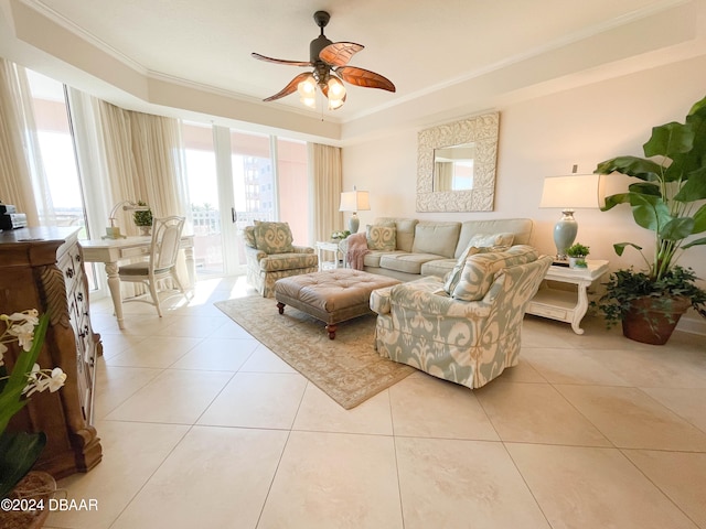 tiled living room featuring ornamental molding and ceiling fan