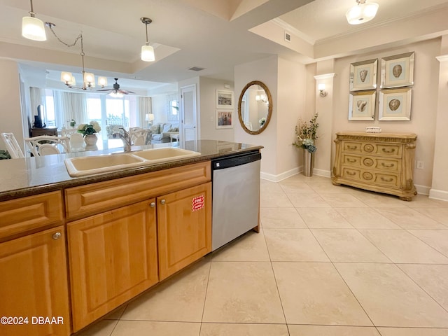 kitchen featuring light tile patterned floors, sink, pendant lighting, and dishwasher