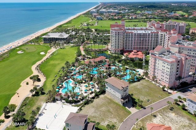 bird's eye view featuring a water view and a view of the beach