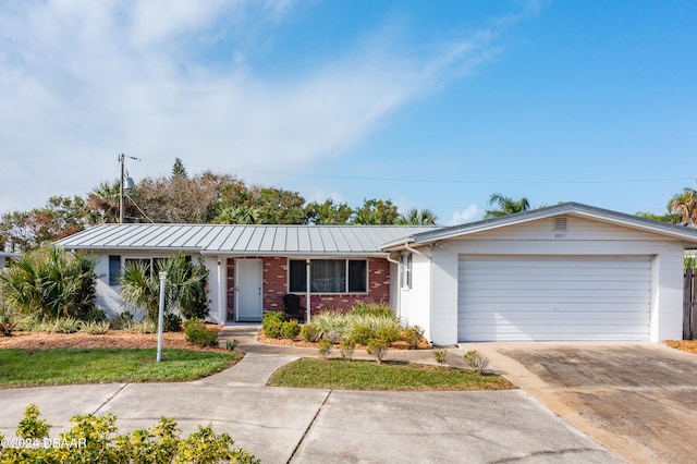 single story home with a garage