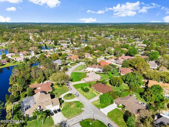 aerial view featuring a residential view and a water view