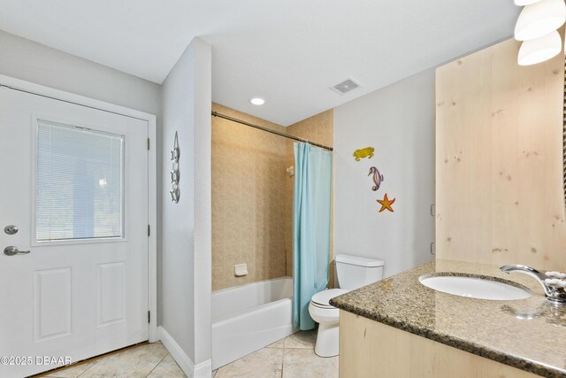 full bathroom with tile patterned floors, vanity, toilet, and shower / bathtub combination with curtain