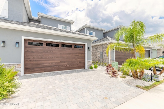 view of front of home with a garage