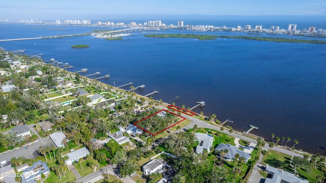 bird's eye view with a water view and a city view