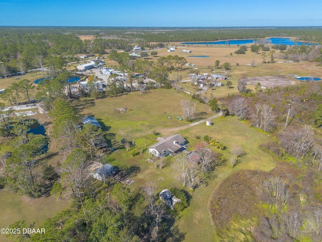 bird's eye view with a water view and a rural view