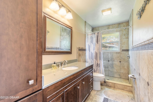 bathroom with tile patterned floors, vanity, toilet, and a shower with shower curtain