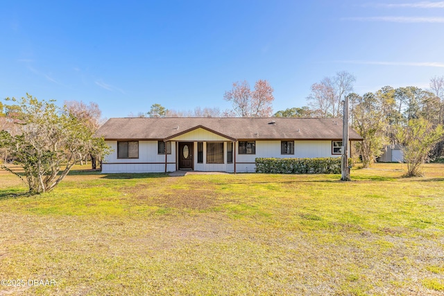 single story home with a front lawn