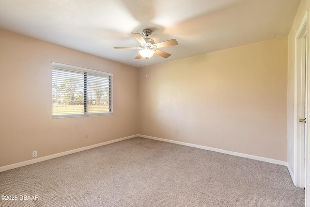 unfurnished room featuring carpet flooring and ceiling fan