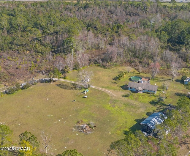 birds eye view of property featuring a rural view