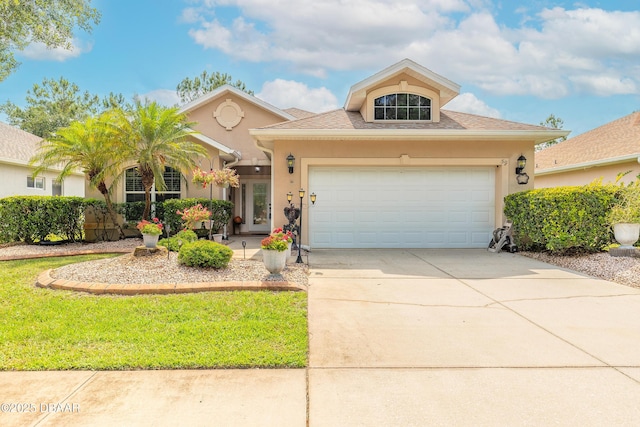 59 Westland Run, Ormond Beach, FL 32174 - view of front of house featuring a garage, concrete driveway, and stucco siding