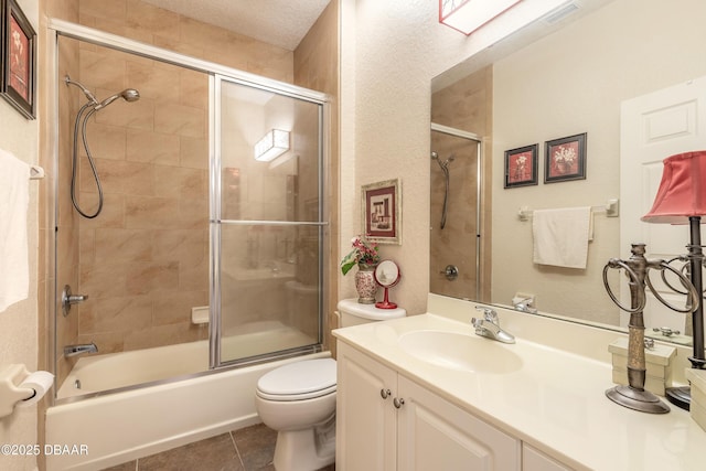 59 Westland Run, Ormond Beach, FL 32174 - full bath with toilet, vanity, enclosed tub / shower combo, and tile patterned floors