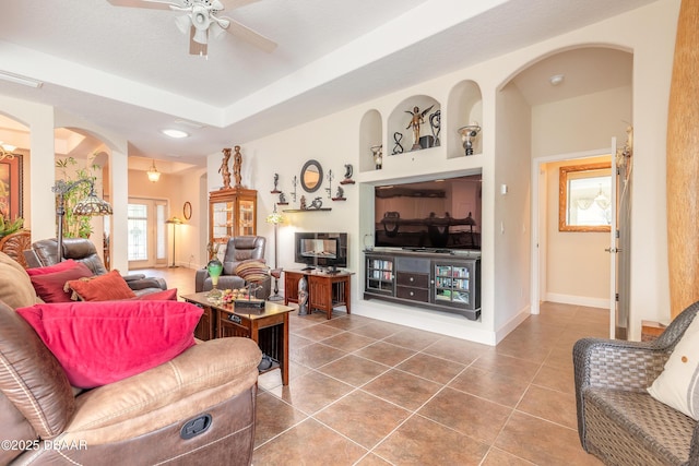59 Westland Run, Ormond Beach, FL 32174 - living room with tile patterned flooring, ceiling fan, arched walkways, baseboards, and recessed lighting