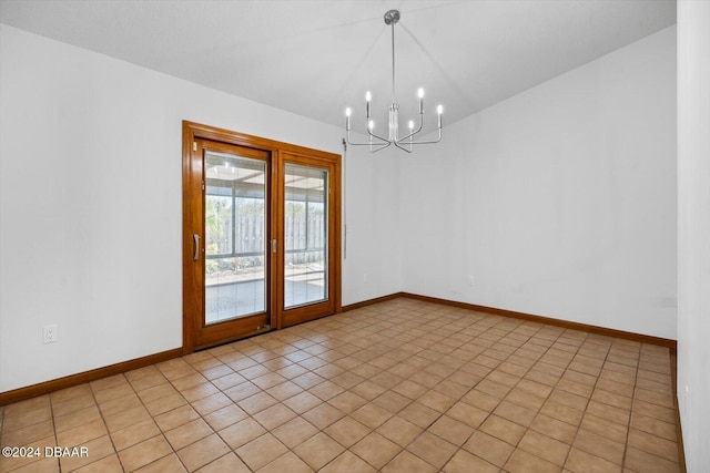 tiled empty room featuring vaulted ceiling and an inviting chandelier