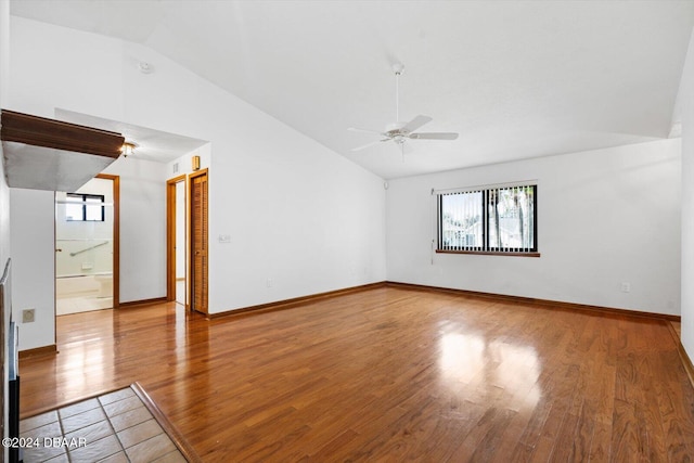 interior space with hardwood / wood-style floors, ceiling fan, and lofted ceiling