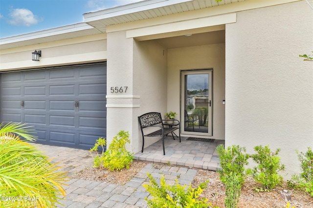 entrance to property featuring a garage