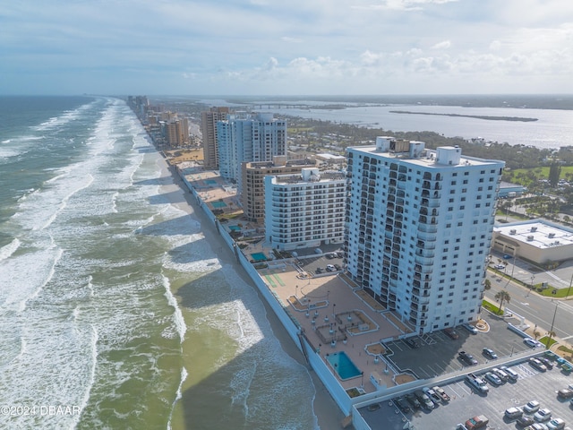 aerial view with a view of the beach and a water view