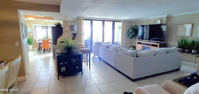 living room with a textured ceiling, light tile patterned flooring, and ornamental molding