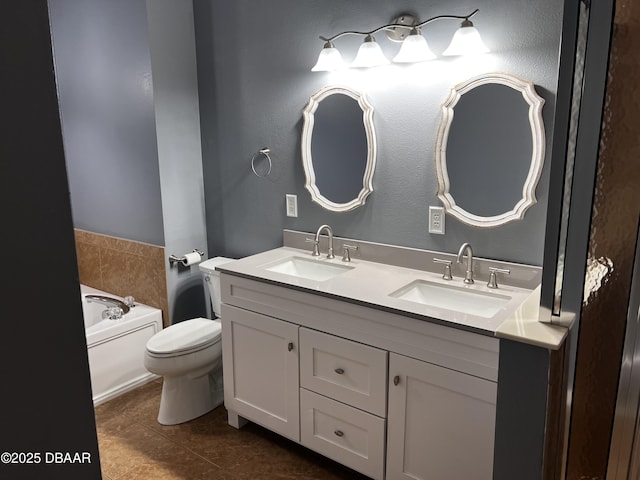 bathroom with double vanity, a bath, a sink, and tile patterned floors