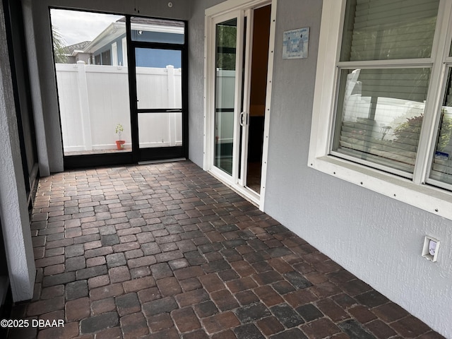 view of unfurnished sunroom