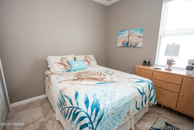 bedroom with baseboards