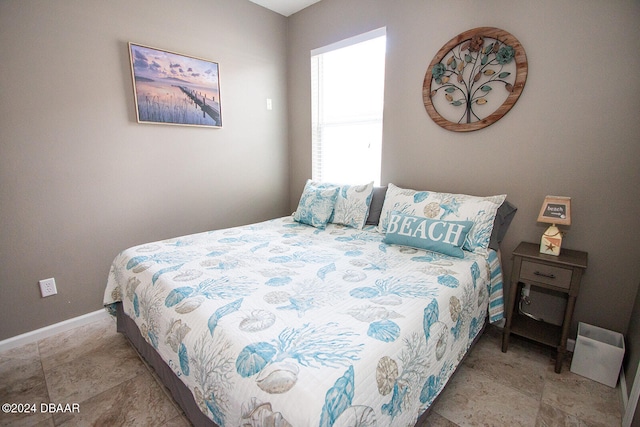 bedroom with baseboards