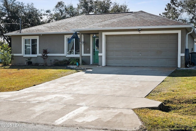 ranch-style home featuring a garage and a front yard