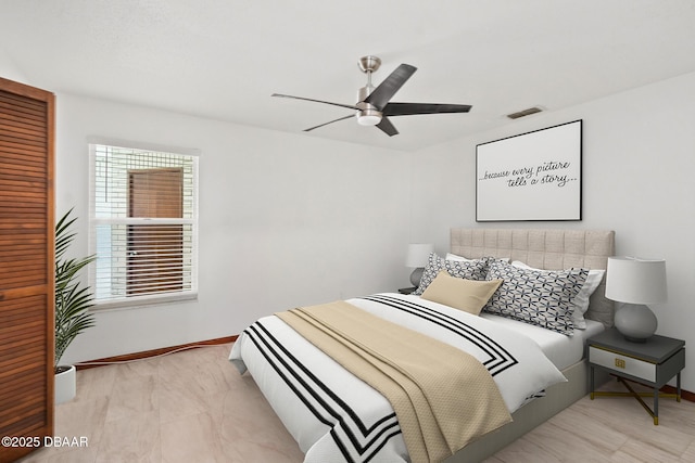 156 S Woodbridge Cir, Daytona Beach, FL 32119 - bedroom with baseboards and ceiling fan