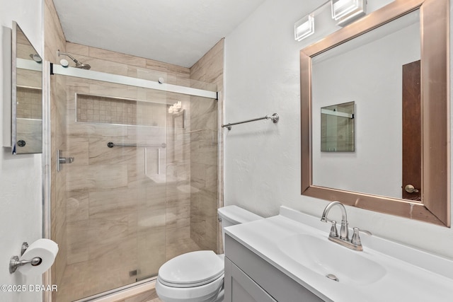 156 S Woodbridge Cir, Daytona Beach, FL 32119 - full bath featuring toilet, vanity, and a stall shower