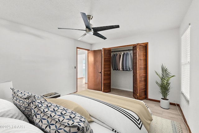 156 S Woodbridge Cir, Daytona Beach, FL 32119 - bedroom featuring a closet, baseboards, and ceiling fan