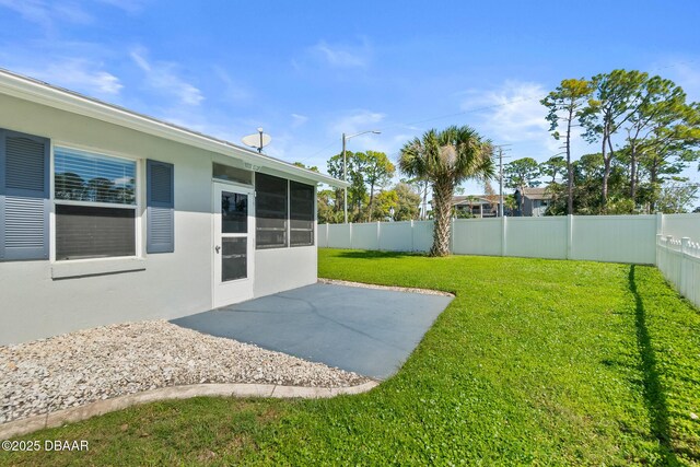 156 S Woodbridge Cir, Daytona Beach, FL 32119 - view of yard with a patio and a sunroom