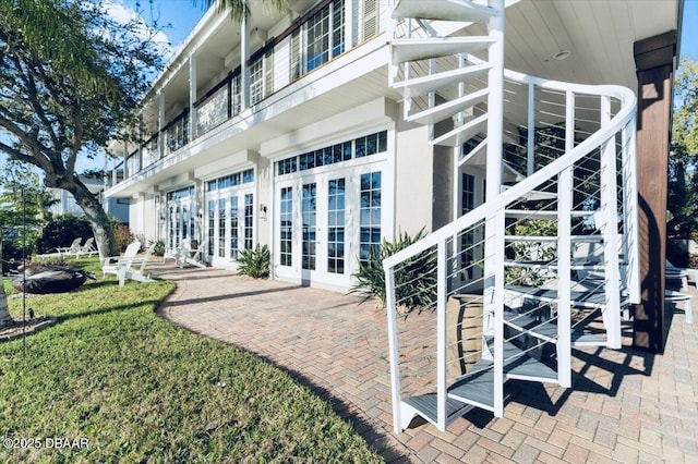 exterior space featuring french doors, a patio, and stairway